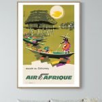 Affiche vintage Air Afrique avec scène de pêche au coucher de soleil.