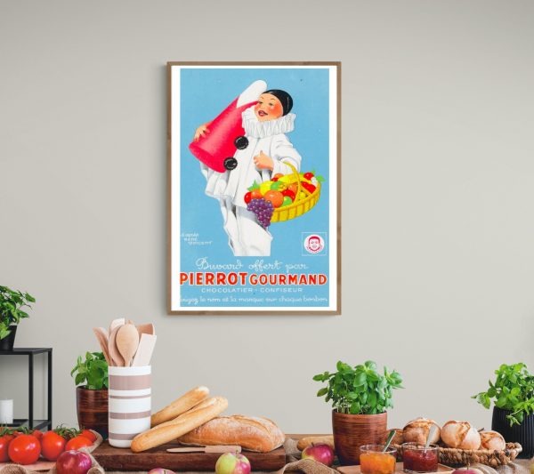 Affiche vintage de Pierrôt Gourmand, chocolatier et confiseur, avec illustration colorée d'un clown.